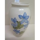 A Moorcroft white ground vase - Height 19cm