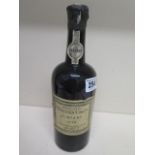 A bottle of Constantino's vintage 1958 port - some minor damage to seal level below neck