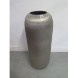 A Libra metal cylinder vase - Height 82cm