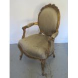 A French style gilt open elbow chair with silk cover - Height 95cm x Width 56cm