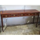 A mahogany five drawer hall table on turned legs - made by a local craftsman to a high standard -