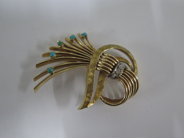 A yellow gold diamond and turquoise brooch surface tests to approx 18ct - 4.5cm x 3cm - approx