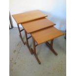 A nest of vintage teak side tables - Height 52cm x 56cm x 40cm