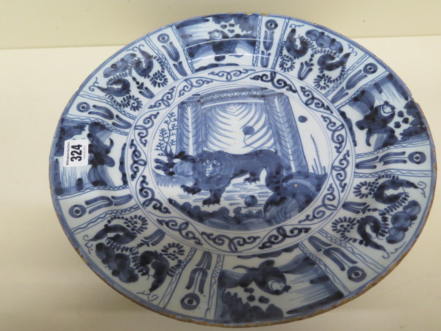 An 18th century Delft charger decorated with Lion of Judah and Oriental figures - Diameter 36cm -