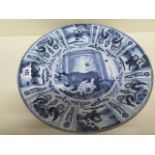 An 18th century Delft charger decorated with Lion of Judah and Oriental figures - Diameter 36cm -