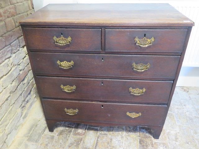 A Georgian oak five drawer chest on bracket feet - Height 93cm x Width 92cm x Depth 51cm