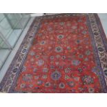 A hand knotted woolen Sarough rug - 3.70m x 2.58m - in good condition