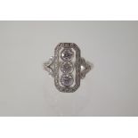 An 18ct white gold diamond Art Deco style ring with three central diamonds each approx 0.24ct - ring
