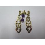 An 18ct yellow gold and amethyst brooch - 3cm x 5.5cm - approx weight 11.4 grams