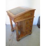 A 19th century mahogany davenport desk with three active drawers and an ink side drawer - Height