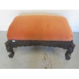 A Colonial carved stool with drop in seat - Height 45cm x 90cm x 53cm