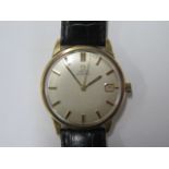 An Omega Automatic gold cased date wristwatch - case 33mm, on a leather strap, in working order,