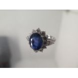 An 18ct white gold sapphire and diamond ring - sapphire approx 4.25ct, diamonds approx 2ct - ring