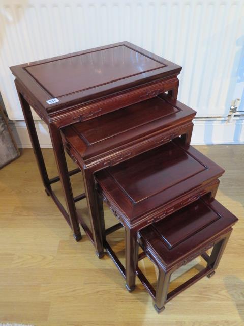 A set of four Chinese hardwood tables, 20th century - in good polished condition - Height 66cm x