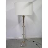 A modern mirrored standard height lamp with shade - Height 172cm