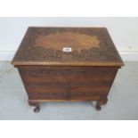 A carved work box with two drawers and lift up top - Height 39cm x 40cm x 28cm