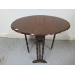 A late Victorian drop leaf mahogany Sutherland side table - Height 62cm x 82cm x 60cm - in good