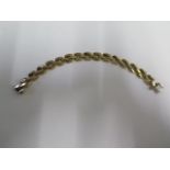 A 9ct yellow gold hollow bracelet - Length 18cm x 11mm wide - approx weight 13.5 grams - some