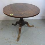 An oak tripod coffee table - Height 44cm x Diameter 52cm