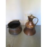 An Eastern copper and brass water jug - Height 45cm and a cooking pot