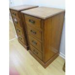 A pair of satin walnut four drawer bedside chests - Height 79cm x 41cm x 37cm - in good polished