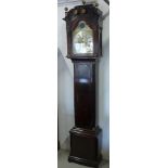 A mahogany 8 day striking longcase clock with an arched brass 12 inch moon roller dial, secondary