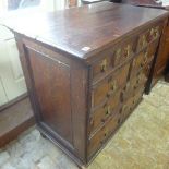 An 18th century oak chest with two short drawers over three long drawers with a nice patina -