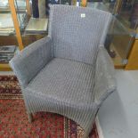 A Lloyd Loom style armchair