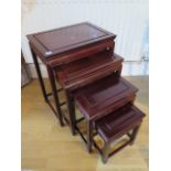 A set of four Chinese hardwood tables, 20th century - in good polished condition - Height 66cm x