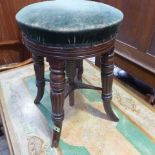 A 19th century mahogany revolving piano stool - revolves but doesn't rise