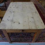 A pine table with a single drawer - Length 125cm x Height 76cm x Width 80cm