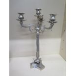 A triform polished metal candelabra - Height 55cm