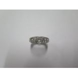 A white metal diamond eternity ring size O - diamonds bright - approx weight 4.5 grams