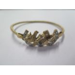 A 9ct yellow gold hallmarked horse head bangle - 7cm x 6cm external - approx weight 20 grams