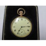 A 9ct yellow gold top wind pocket watch with gold dust cover - 50mm case - approx weight 78.8