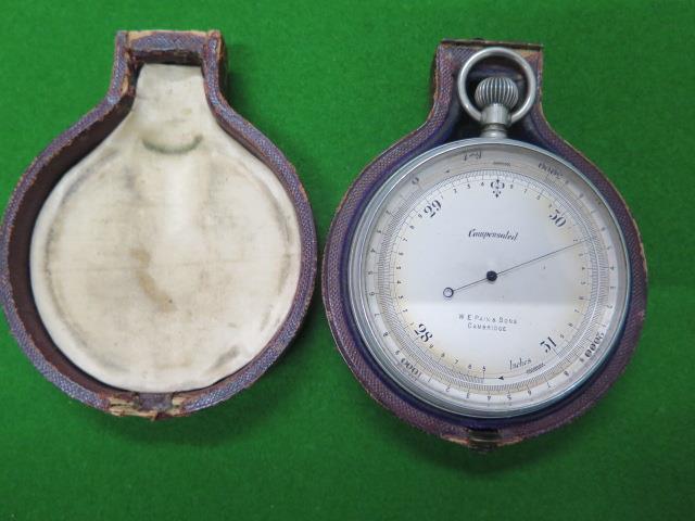 A compensated pocket barometer with rotating outer dial, the dial signed W E Pain & Sons Cambridge -