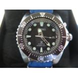 A Seiko Prospex kinetic divers watch on a cloth strap with tag, box and booklets - ticks but stops