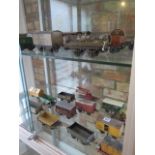 A collection of 26 Hornby and other tinplate and wood rolling stock - original paint, some wear