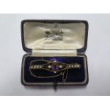 A 15ct yellow gold pearl and amethyst brooch - approx weight 4.2 grams - with box