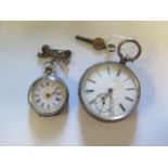 A silver pocket watch by John Brackhurst of Crewe 48mm case and a silver ladies watch with bow