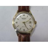 A Movado 28 jewel 9ct yellow gold automatic gents wristwatch with date - 34mm case - running,