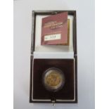 A Royal Mint fine gold 1/4 oz proof Britannia £25 2003 coin - boxed with certificate