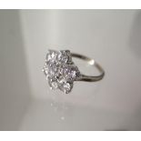 A good quality 18ct white gold seven stone diamond cluster ring - each diamond approx 0.50ct - total