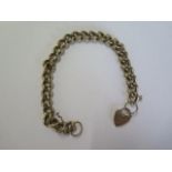 A 9ct yellow gold bracelet - Length 22cm - with safety chain, approx 42.3 grams
