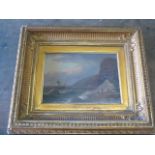A 19th century oil on wooden panel shipwreck scene in a gilt frame - frame size 31cm x 37cm -