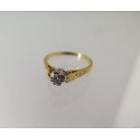 An 18ct yellow gold diamond ring size M - approx weight 2.6 grams