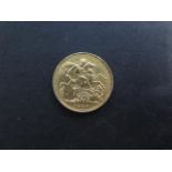 A Victorian gold full sovereign coin dated 1900