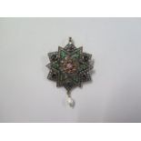 A white and yellow metal multi stone and diamond star pendant brooch with a drop pearl 44mm wide,
