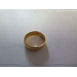 A 22ct yellow gold band ring size O/P - approx weight 5.5 grams