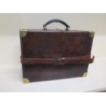 A good quality leather and brass cartridge case makers label Arthur J Chamberlain late Frederick Woo